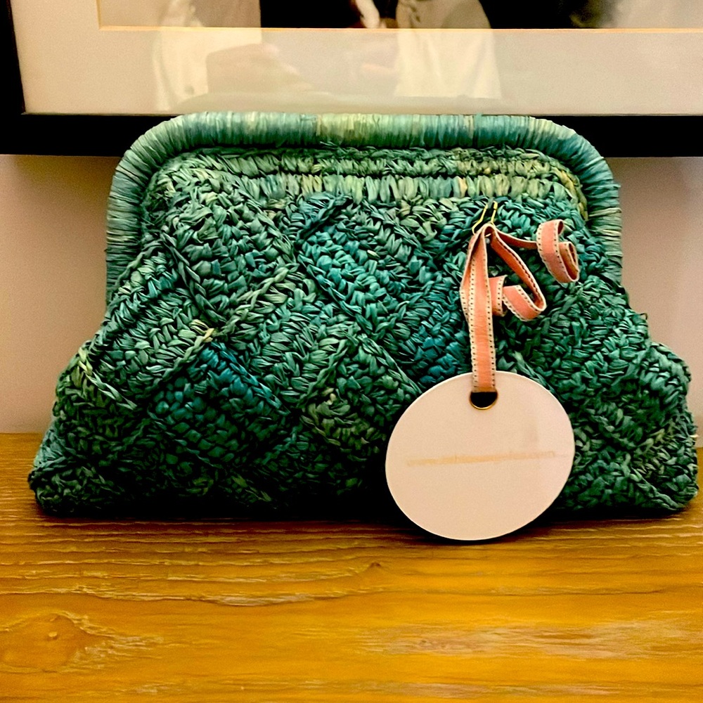 Woven green clutch